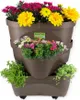 A tiered planter filled with colorful flowers and green plants, set against a white background. Produktbild-Vorschau