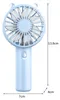 A light blue handheld fan with dimensions indicated by measurement lines and numbers. Produktbild-Vorschau