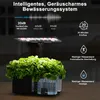 A smart indoor gardening system with a LED grow light and lush green plants. Produktbild-Vorschau