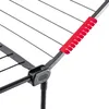 A close-up shot of a black and red clothes drying rack. Produktbild-Vorschau