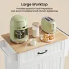 A kitchen cart with appliances and food on its worktop. Podgląd zdjęcia produktu