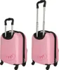 Two pink suitcases with cartoon faces are shown against a white background. Anteprima dell’immagine prodotto