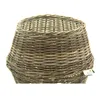 A woven rattan basket stand for a Christmas tree, shown against a white background. Produktbild-Vorschau