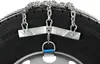 A close-up view of snow chains attached to a tire. Produktbild-Vorschau