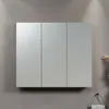A mirrored cabinet with three doors mounted on a textured gray wall. Produktbild-Vorschau