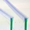 Close-up of two shower door seals attached to glass panels. Anteprima dell’immagine prodotto