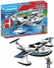 A Playmobil police seaplane toy set, shown both in its packaging and as a separate assembled toy with a figure. Produktbild-Vorschau