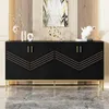 A black sideboard with gold accents is displayed in a well-lit room with a decorative painting and sculptures on top. Anteprima dell’immagine prodotto
