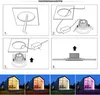 The image shows a step-by-step guide for installing LED recessed lights, followed by four lifestyle images of a modern house illuminated with different colored lights. Produktbild-Vorschau