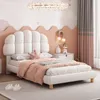 A child's bedroom with a bed, nightstand, and wall decor. Produktbild-Vorschau
