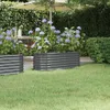 A garden scene with raised garden beds and hydrangeas. Produktbild-Vorschau