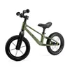 A green balance bike with black wheels and seat is shown against a white background. Produktbild-Vorschau