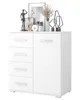 A white cabinet with drawers and a door, decorated with various objects on top. Produktbild-Vorschau