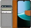 A flip case for a smartphone, showing the inside with card slots and the phone in place. Podgląd zdjęcia produktu