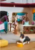 A toy horse stable playset with figures and accessories. Produktbild-Vorschau