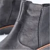 A close-up view of a black leather boot. Náhľad obrázku produktu