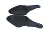 Two black raclette pans with handles, presented against a white background. Produktbild-Vorschau