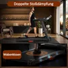 A man is walking on a treadmill in a modern home gym setting. The image is split into two parts, with the bottom part showing a close-up of the treadmill's cushioning system. Voir les images du produit