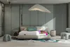 A bedroom scene with a cutaway mattress showing its layers. Produktbild-Vorschau