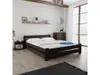 A bedroom scene with a bed, nightstand, and dresser. Náhled obrázku produktu