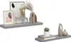 Two grey floating shelves are displayed against a white background, each decorated with various decorative items. Náhled obrázku produktu