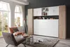 A living room with a murphy bed system, seating, and a large window. Produktbild-Vorschau