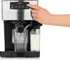 A hand is pressing a button on a BEEM espresso machine. Produktbild-Vorschau