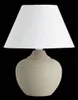 A table lamp with a cream-colored ceramic base and a white fabric shade, isolated on a black background. Náhľad obrázku produktu
