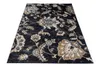 A close-up, angled view of a floral patterned rug on a white background. Náhled obrázku produktu