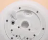 A close-up view of the underside of a white solar garden light, showing the charging port, screws, and a switch. Produktbild-Vorschau