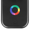 A close-up view of a black electronic device with a circular RGB light indicator and a power button. Podgląd zdjęcia produktu
