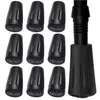 A collection of black rubber tips for trekking poles, arranged in rows, with one pole tip shown attached to a pole on the right. Podgląd zdjęcia produktu