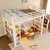 A loft bed with a sofa and coffee table underneath, set up in a room. Voir les images du produit