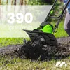 A person is using a green and black electric tiller to cultivate soil in a garden. Náhľad obrázku produktu