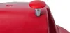 A close-up view of a red object with a silver and red button on top. Náhľad obrázku produktu