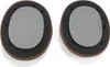 Two ear pads for headphones are shown against a white background. Podgląd zdjęcia produktu
