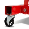 A close-up view of a red metal beam with a black wheel attached by a silver bracket and bolts. Anteprima dell’immagine prodotto