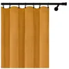 A close-up of a yellow velvet curtain hanging from a black curtain rod. Náhled obrázku produktu