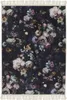 A dark, moody floral pattern on a rug. Produktbild-Vorschau