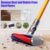 A vacuum cleaner head with a soft roller brush is shown on a wooden floor with debris. Above, there are images illustrating different floor types and types of debris. Produktbild-Vorschau