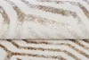 A close-up view of a rug with a zig-zag pattern. Náhled obrázku produktu