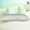 A pillow with green arrows indicating airflow above it, suggesting breathability. Náhled obrázku produktu