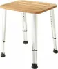 A shower stool with a wooden seat and adjustable metal legs. Anteprima dell’immagine prodotto
