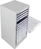 A gray metal filing cabinet with multiple clear plastic drawers, one of which is pulled out. Produktbild-Vorschau
