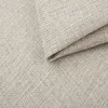 A close-up view of beige fabric with a woven texture, showing a fold in the material. Produktbild-Vorschau