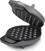 An open bubble waffle maker with its non-stick cooking plates visible. Produktbild-Vorschau