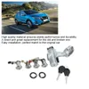 A blue SUV driving on a road, with a set of car ignition switch parts and keys below. Podgląd zdjęcia produktu