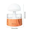 A mushroom-shaped humidifier with wood grain base and measurement indicators. Náhled obrázku produktu