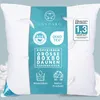 A white pillow with a teal label in the center, featuring product information and certifications. Produktbild-Vorschau