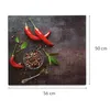 A close-up overhead view of red chili peppers, a bowl of peppercorns, and a spoon on a dark, textured surface. Dimensions are indicated by text on the right and bottom. Náhled obrázku produktu